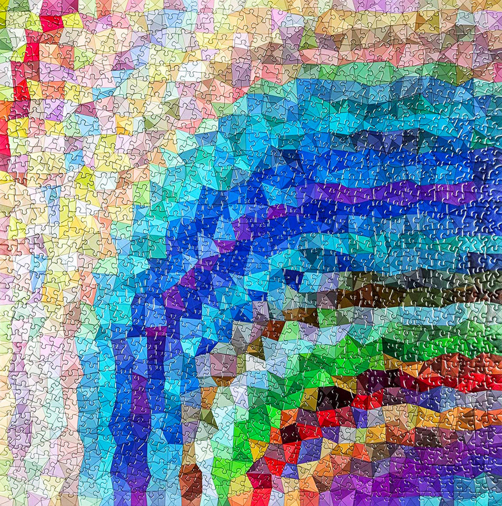 The 1000-piece Colour Gradient Triangle Lines Jigsaw Puzzle from UK company Rest In Pieces is a challenging game for adults.